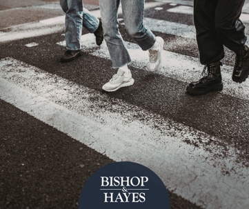 Pedestrians crossing at a crosswalk