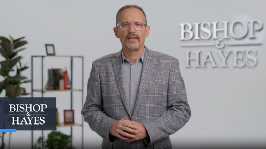 Tim Hayes standing in an office.